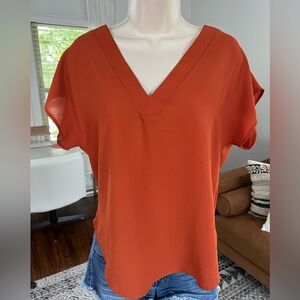 Forever 21 size small loose fitting burnt orange v-neck